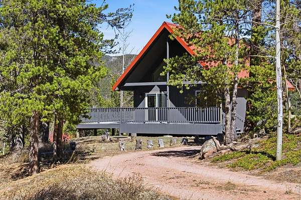 1.69 Acres of Land with Home for Sale in Red Feather Lakes, Colorado