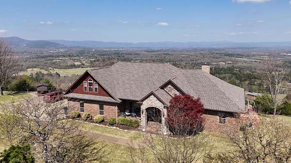 6.44 Acres of Land with Home for Sale in Mena, Arkansas