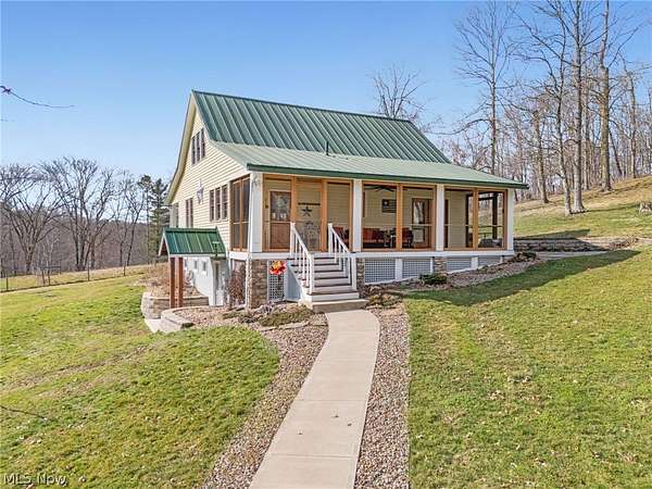 22.9 Acres of Land with Home for Sale in Carrollton, Ohio