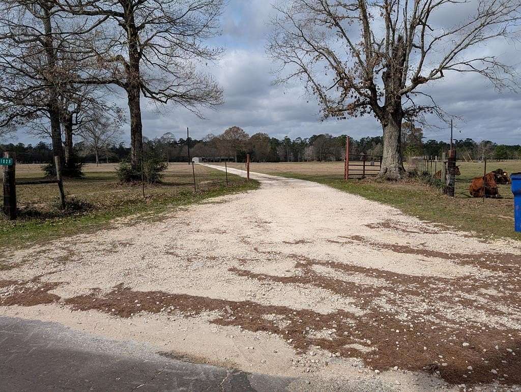 25 Acres of Recreational Land with Home for Sale in Buna, Texas