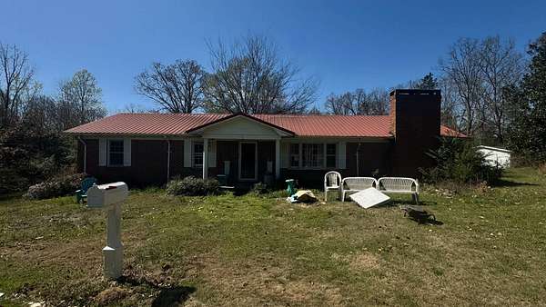 6.7 Acres of Land with Home for Sale in Bankston, Alabama