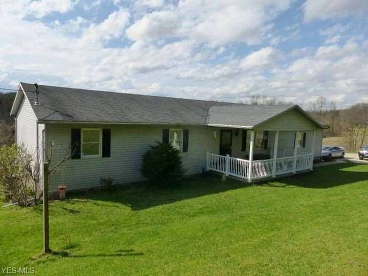 5.13 Acres of Land with Home for Sale in New Concord, Ohio