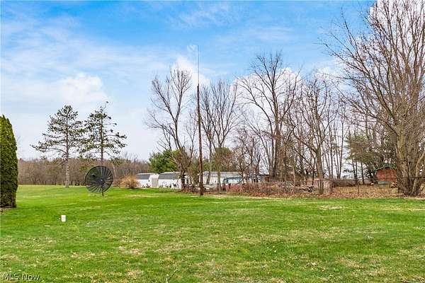 4.83 Acres of Land with Home for Sale in Zanesville, Ohio