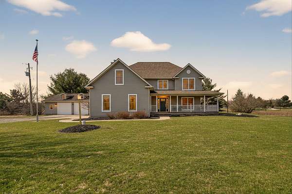 10 Acres of Land with Home for Sale in Eagle, Michigan