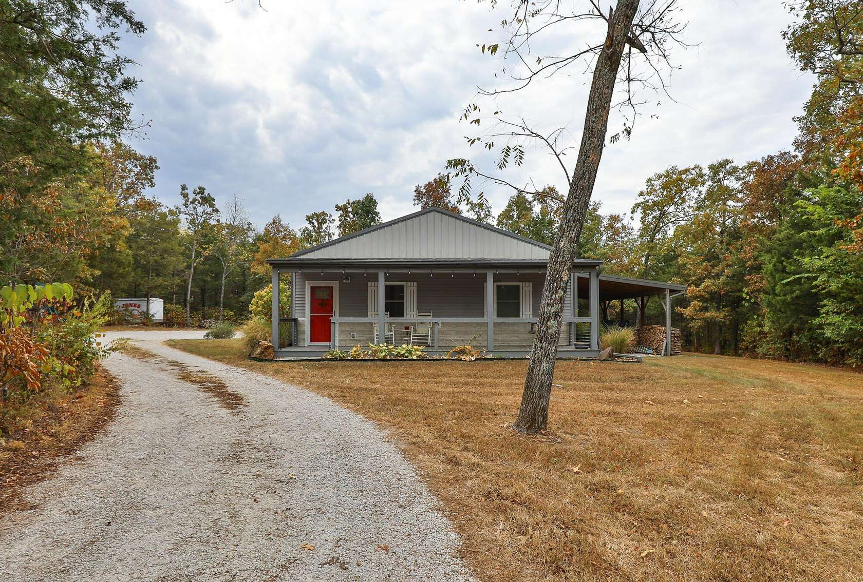 12.2 Acres of Recreational Land with Home for Sale in Pleasant Hope, Missouri