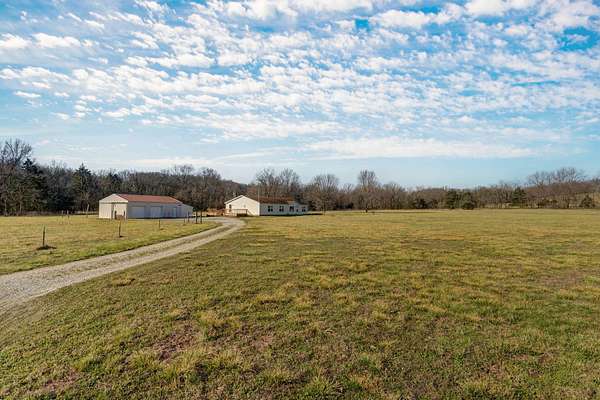 6.28 Acres of Land with Home for Sale in Elkland, Missouri