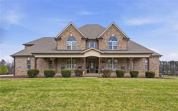 5.17 Acres of Land with Home for Sale in Summerfield, North Carolina