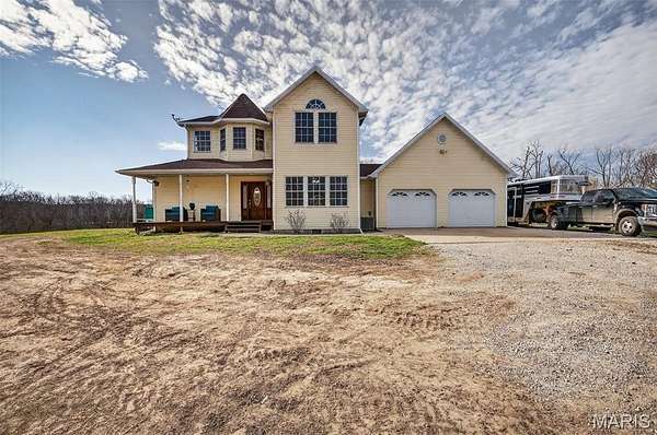 72.8 Acres of Land with Home for Sale in Richland, Missouri