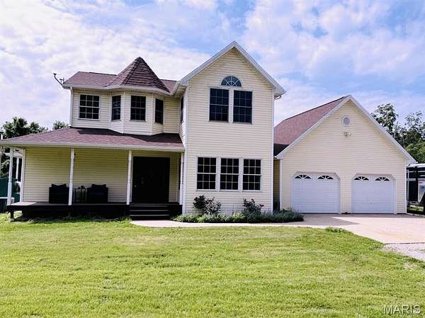 72.8 Acres of Land with Home for Sale in Richland, Missouri