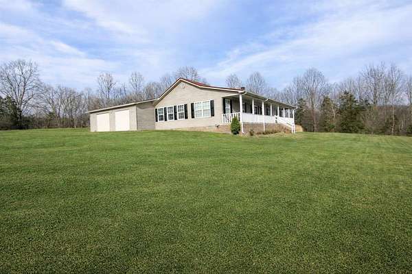 7 Acres of Land with Home for Sale in Edmonton, Kentucky