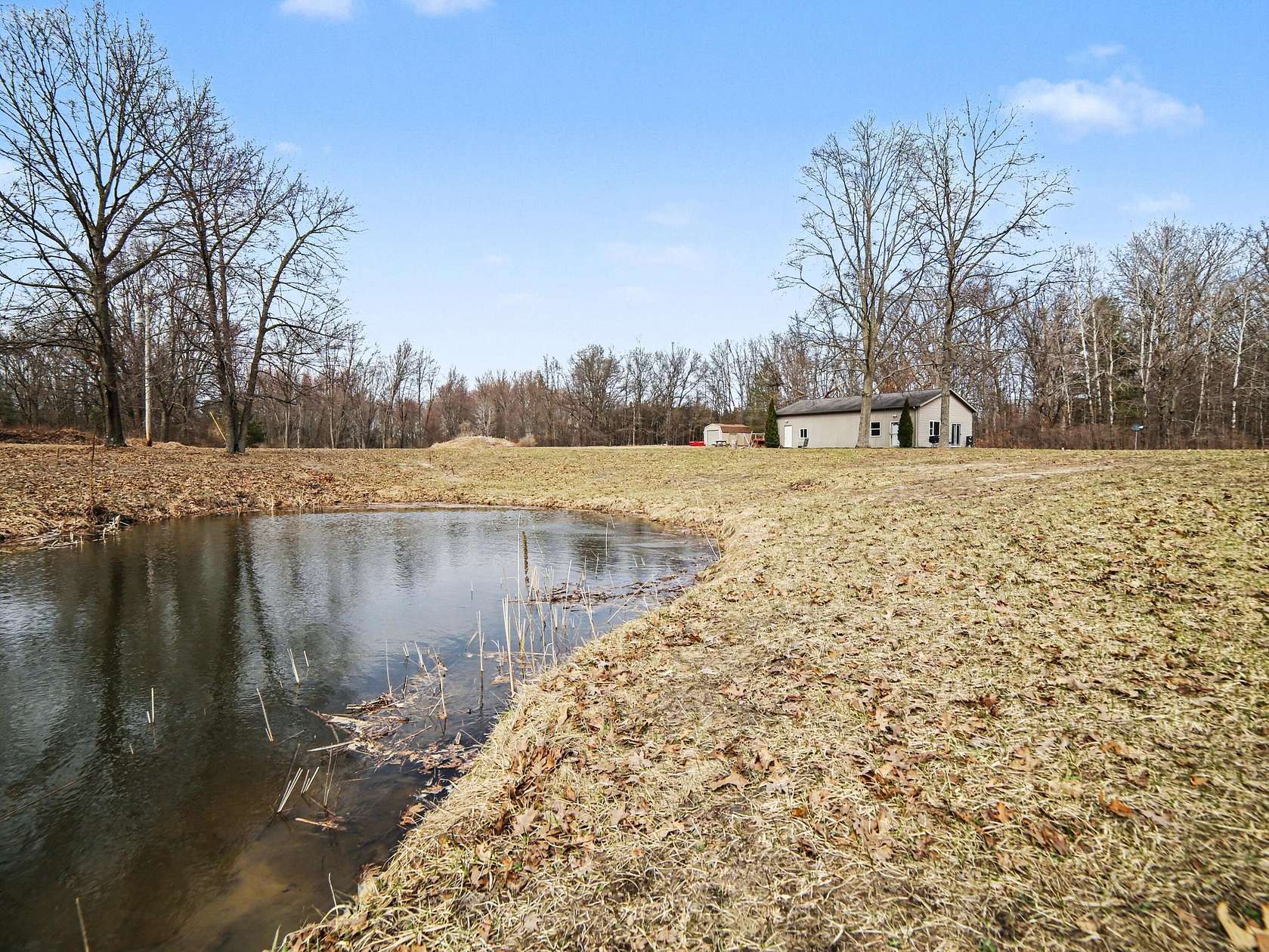 20 Acres of Recreational Land with Home for Sale in Rothbury, Michigan
