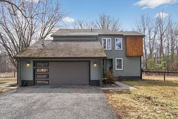 2.33 Acres of Land with Home for Sale in Queensbury, New York