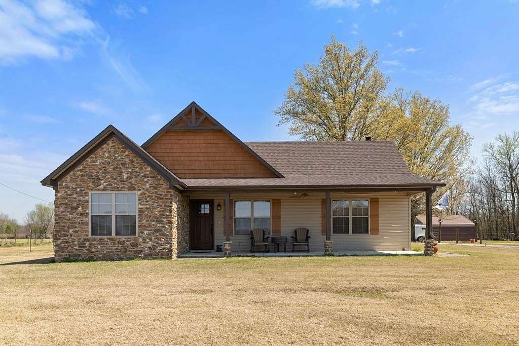 5.12 Acres of Land with Home for Sale in Proctor, Arkansas