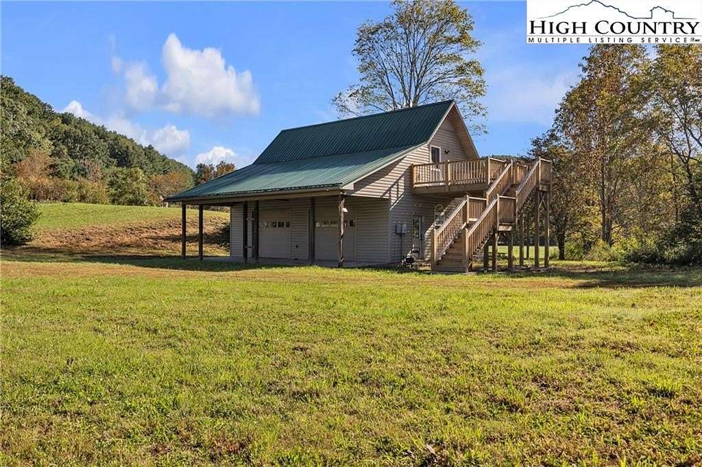 10.3 Acres of Land with Home for Sale in Creston, North Carolina
