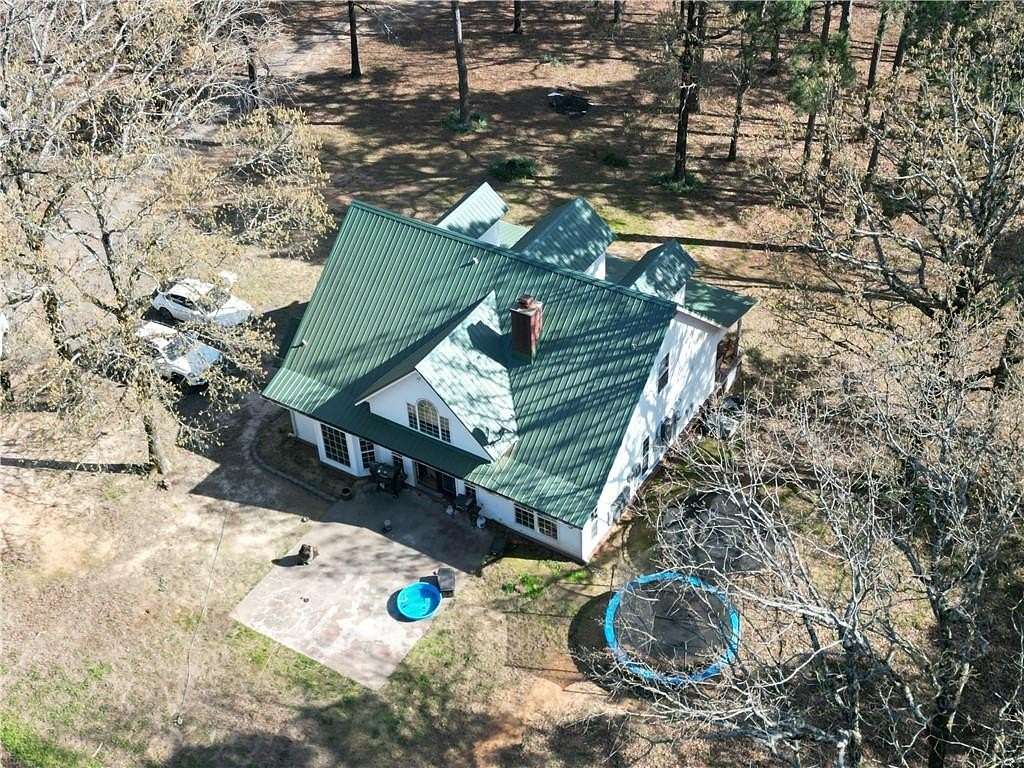 10.6 Acres of Land with Home for Sale in Dardanelle, Arkansas