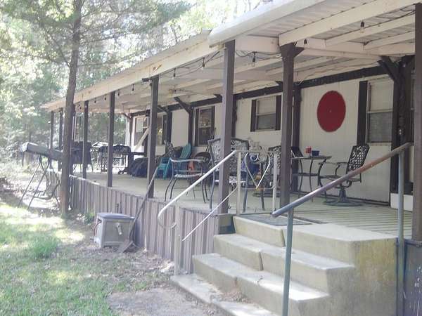 15.7 Acres of Recreational Land with Home for Sale in San Augustine, Texas