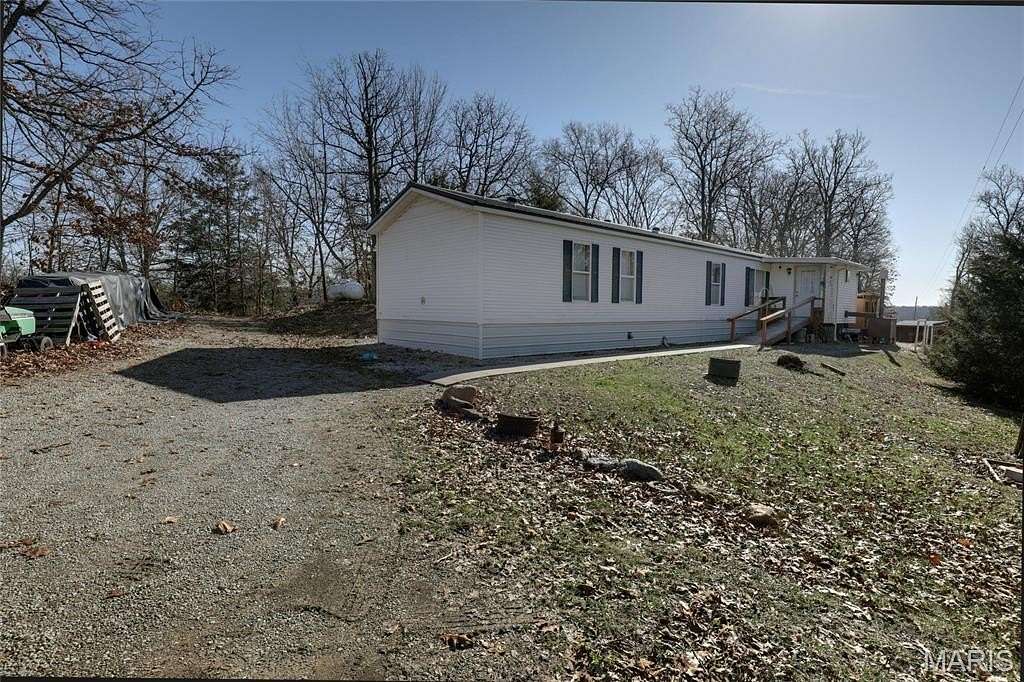 6.2 Acres of Land with Home for Sale in Lewistown, Missouri