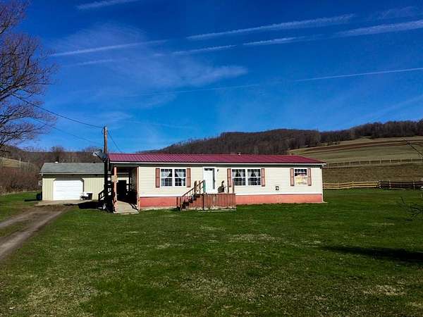 7.78 Acres of Land with Home for Sale in Port Allegany, Pennsylvania