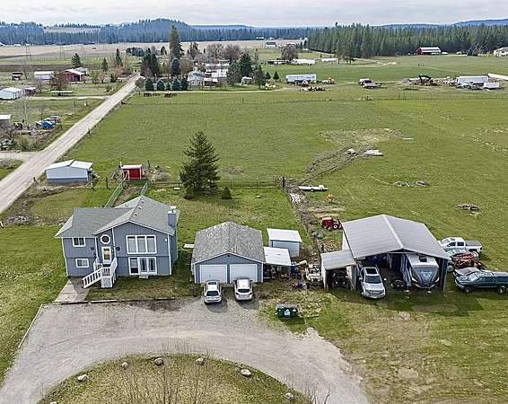 4.77 Acres of Land with Home for Sale in Chattaroy, Washington