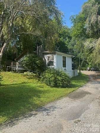 2.7 Acres of Land with Home for Sale in Hendersonville, North Carolina