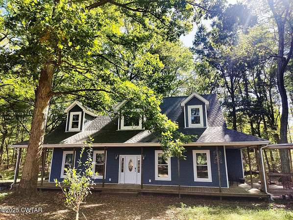 2.6 Acres of Land with Home for Sale in Atwood, Tennessee