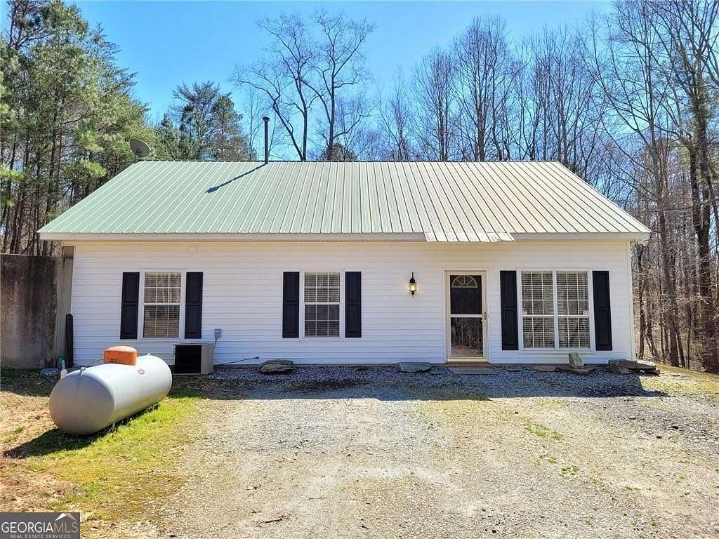 7.14 Acres of Land with Home for Lease in Cumming, Georgia