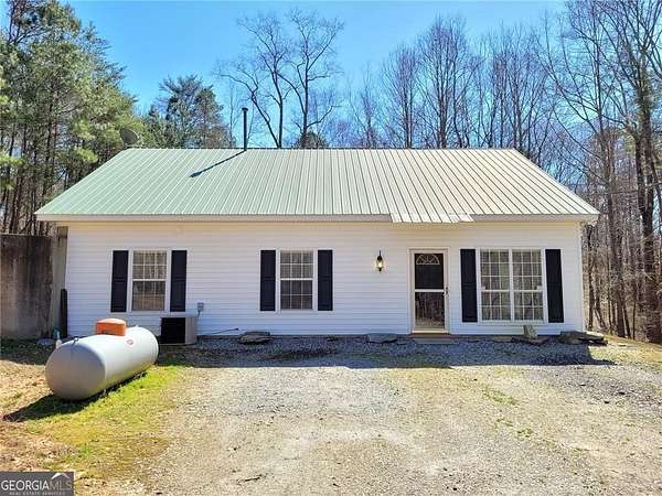 7.14 Acres of Land with Home for Lease in Cumming, Georgia
