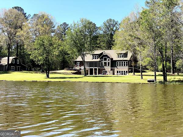 3.47 Acres of Land with Home for Sale in Sharpsburg, Georgia