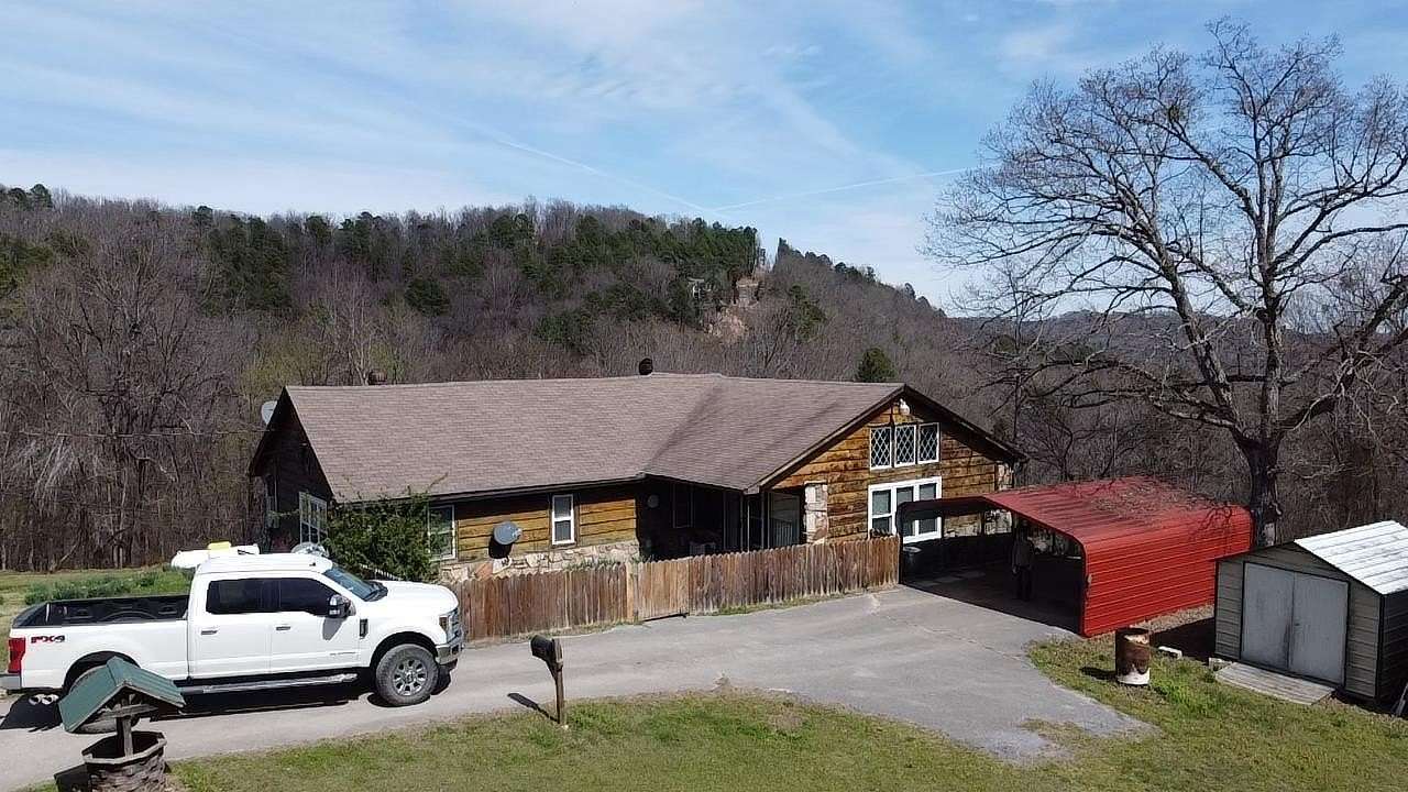 30 Acres of Land with Home for Sale in Melbourne, Arkansas