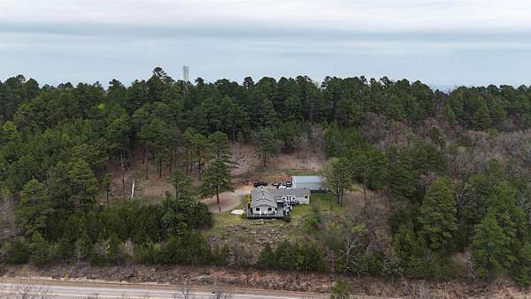 8.5 Acres of Land with Home for Sale in Paris, Arkansas