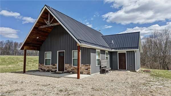 50.3 Acres of Recreational Land with Home for Auction in Coshocton, Ohio