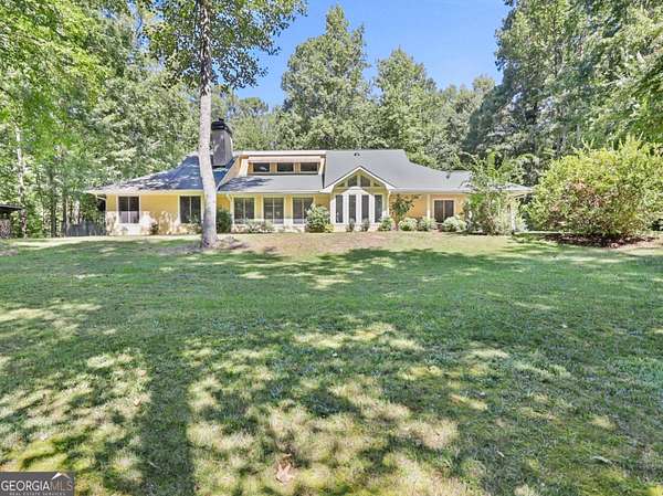 6.65 Acres of Land with Home for Sale in Tyrone, Georgia