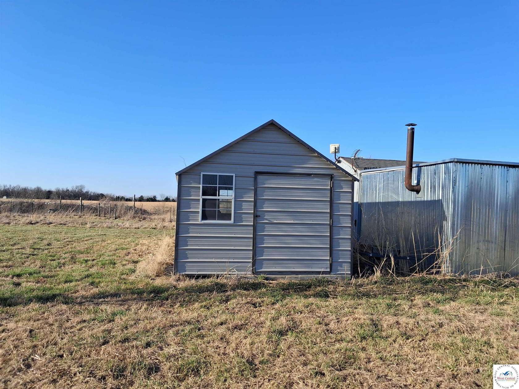 25 Acres of Land with Home for Sale in Stockton, Missouri