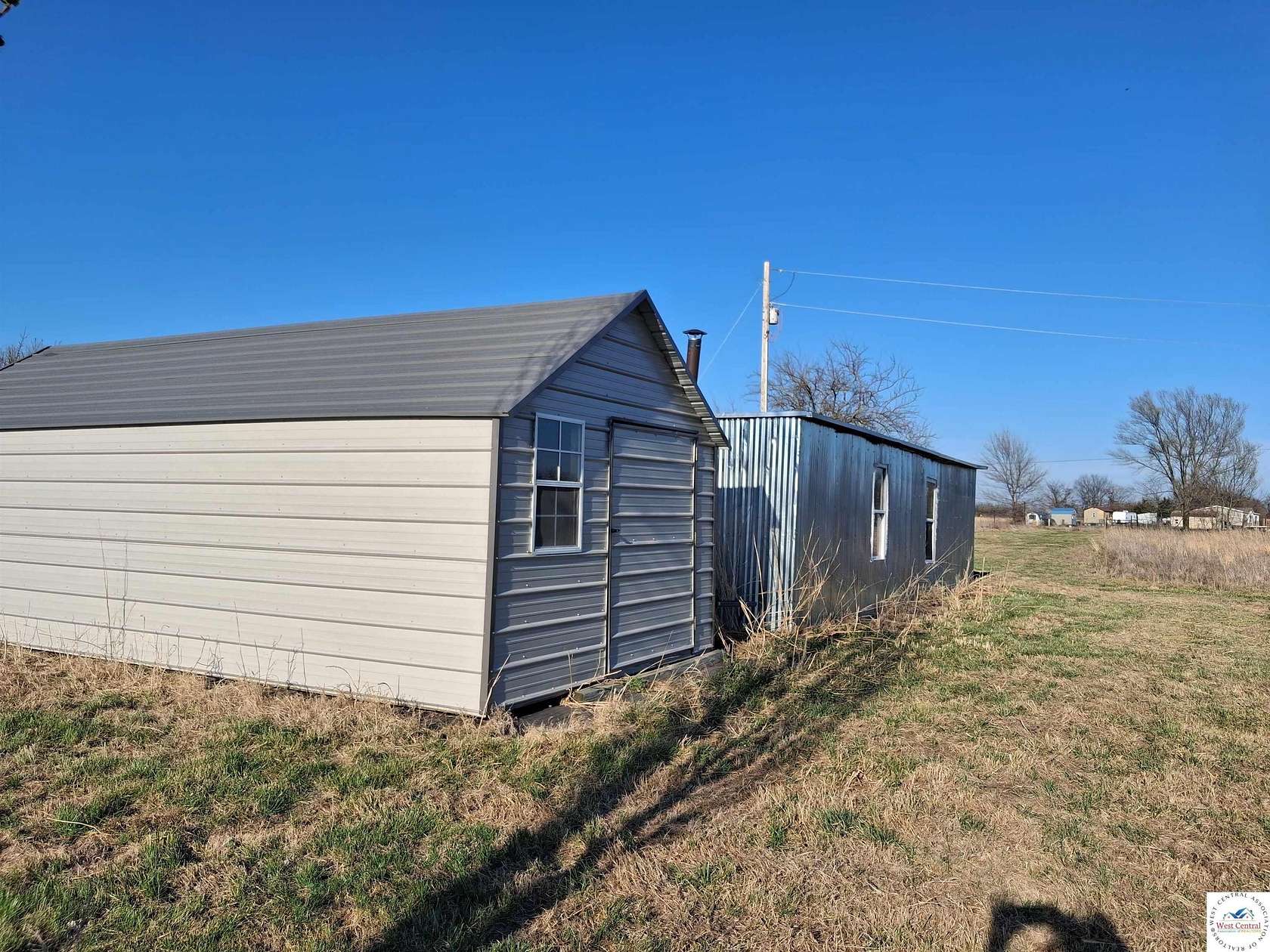 25 Acres of Land with Home for Sale in Stockton, Missouri