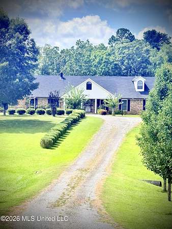 5.6 Acres of Land with Home for Sale in Gore Springs, Mississippi