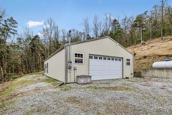 33.1 Acres of Recreational Land with Home for Sale in Elmwood, Tennessee