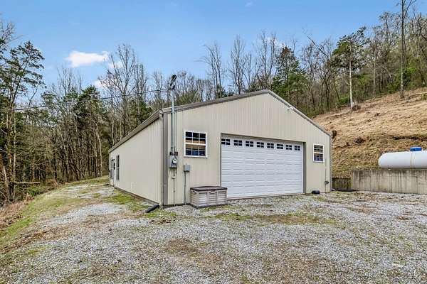 33.1 Acres of Recreational Land with Home for Sale in Elmwood, Tennessee