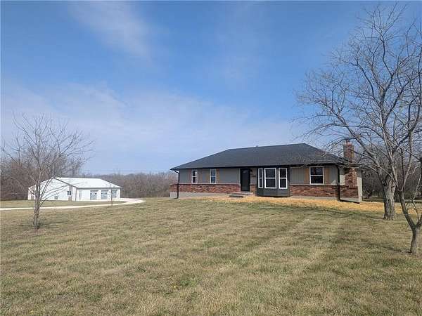 8 Acres of Land with Home for Sale in Harrisonville, Missouri