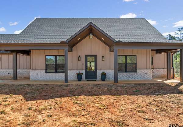 10 Acres of Land with Home for Sale in Jacksonville, Texas