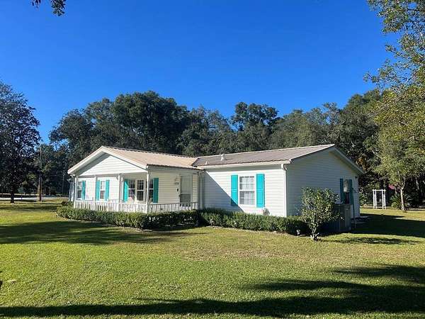 1.79 Acres of Land with Home for Sale in Fanning Springs, Florida