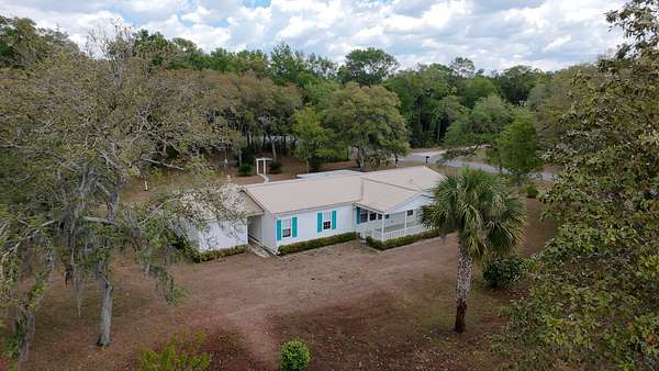 1.79 Acres of Land with Home for Sale in Fanning Springs, Florida