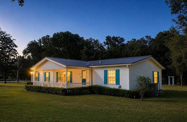 1.79 Acres of Land with Home for Sale in Fanning Springs, Florida