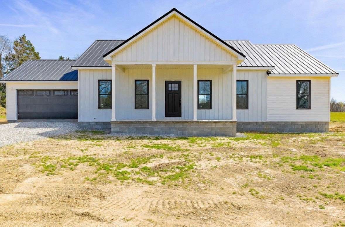 Land with Home for Sale in Nortonville, Kentucky