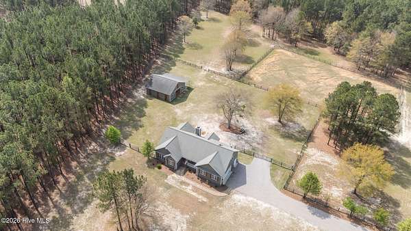 10.4 Acres of Land with Home for Sale in Aberdeen, North Carolina
