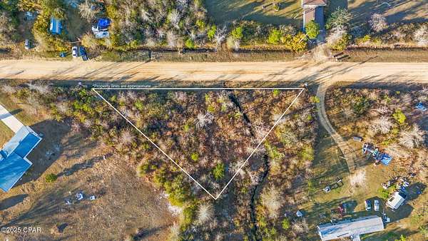 0.99 Acres of Residential Land for Sale in Youngstown, Florida