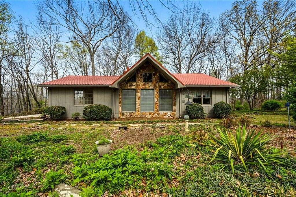 7.73 Acres of Land with Home for Sale in Dallas, Georgia