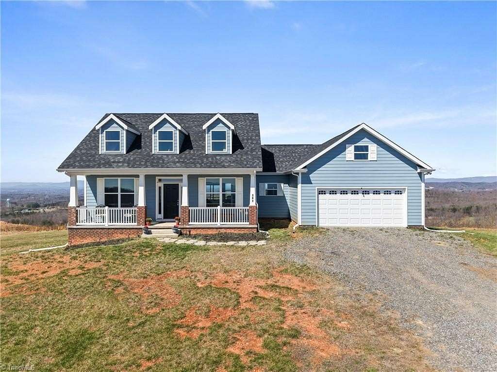 3.9 Acres of Land with Home for Sale in Pilot Mountain, North Carolina