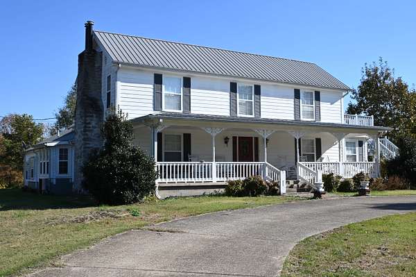 35.2 Acres of Land with Home for Auction in Linden, Tennessee