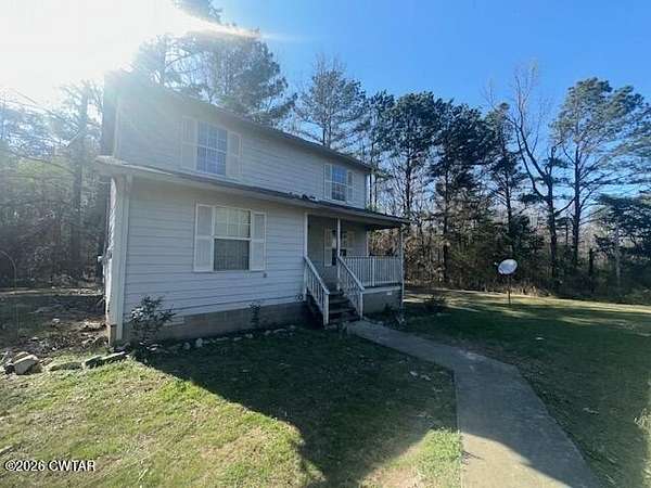 4.9 Acres of Land with Home for Sale in Huntingdon, Tennessee