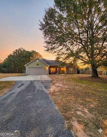 1.56 Acres of Land with Home for Sale in Loganville, Georgia